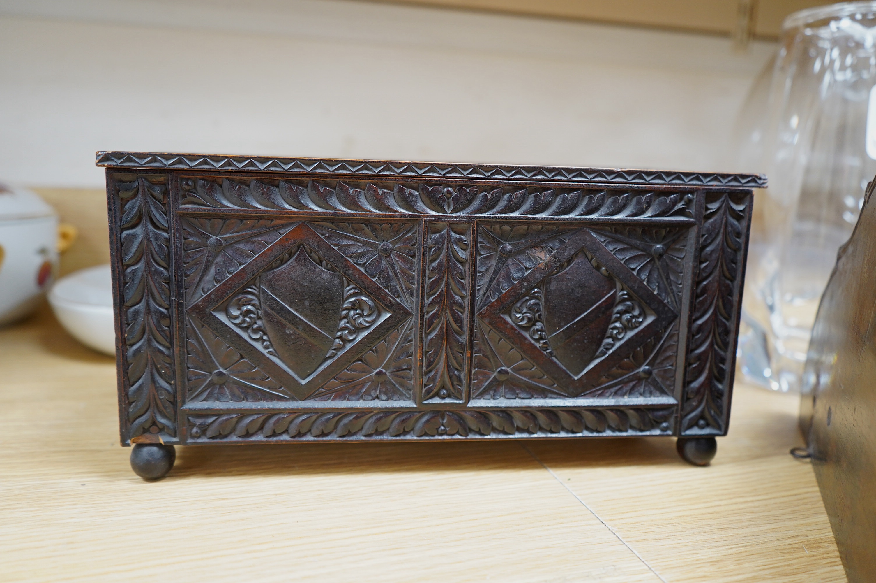 A late 19th century carved walnut and beech eagle wall bracket and a miniature coffer, largest 37cm wide. Condition - fair